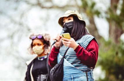Michigan activists Ceena Vang and Zora Bowens protesting anti-Asian American and Pacific Islander violence and hate after Atlanta spa shootings in 2021. Photograph by Marc Klockow