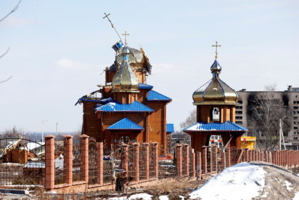 A view shows a damaged church in Volnovakha