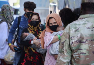 Afghan refugees arrive at Dulles Airport in Virginia