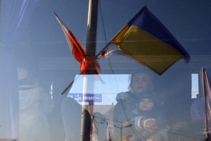FILE PHOTO: People fleeing Russia's invasion of Ukraine arrive at border checkpoint in Medyka