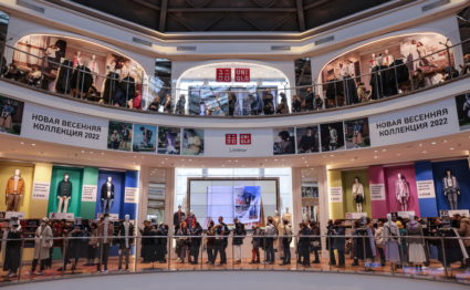 Customers queue to enter a Uniqlo store in Moscow
