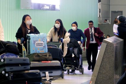 Passengers arrive at LAX from Shanghai, China