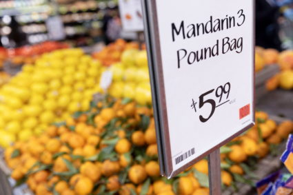 Mandarin and other fruit are seen for sale in a supermarket in Manhattan, New York City