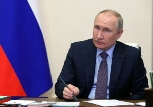 Russia's President Vladimir Putin chairs a meeting outside Moscow