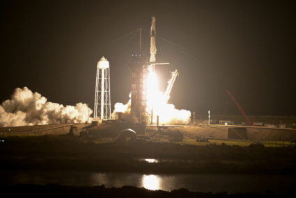 A SpaceX Falcon 9 rocket lifts off carrying four astronauts on a six-month expedition to the International Space Station, ...