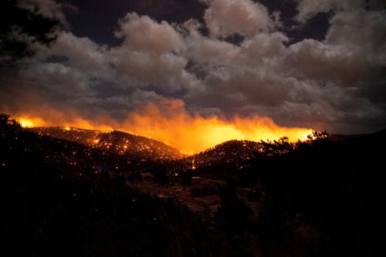 The McBride Fire burns in the heart of the village in Ruidoso, New Mexico, United States, April 12, 2022. Photo by Ivan Pierre Aguirre/USA Today Network via REUTERS.