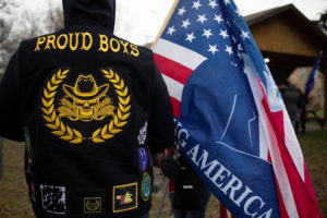 A member of the Proud Boys attends a "Let's Go Brandon Festival" rally, promoted by the Michigan Conservative Coalition and in opposition to U.S. President Joe Biden, in the Brandon Township village of Ortonville, Michigan, U.S. November 20, 2021. Photo by Emily Elconin/REUTERS