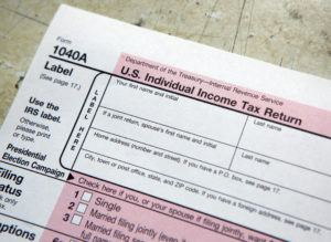 A tax form is pictured on tax deadline day at the main Post Office in New York