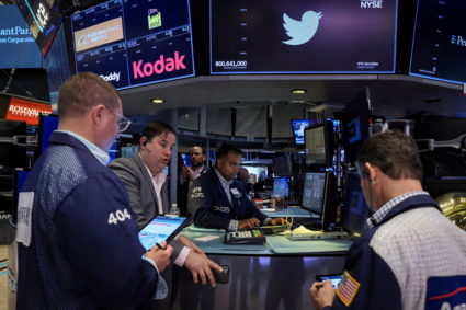 Traders work on the floor of the NYSE in New York City