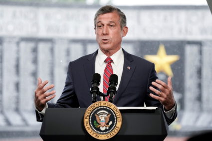 Delaware Governor John Carney delivers remarks at an annual Memorial Day Service at Veterans Memorial Park, Delaware Memorial Bridge, New Castle, Delaware, U.S., May 30, 2021. Photo by Ken Cedeno/REUTERS