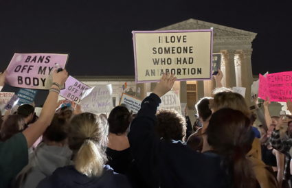 Protestors react outside the U.S. Supreme Court to the leak of a draft majority opinion written by Justice Samuel Alito preparing for a majority of the court to overturn the landmark Roe v. Wade abortion rights decision later this year, in Washington, U.S., May 2, 2022. Photo by Moira Warburton/REUTERS