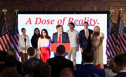 Pennsylvania Republican U.S. Senate candidate Dr. Mehmet Oz is joined by his wife Lisa Oz as he speaks at his primary election night watch party in Newtown, Pennsylvania, U.S. May 17, 2022. Photo by Hannah Beier/REUTERS