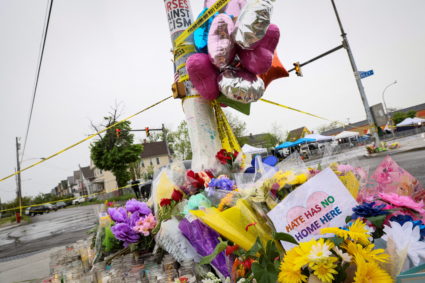 A memorial is seen in the wake of a weekend shooting at a Tops supermarket in Buffalo, New York, U.S. May 18, 2022. Photo by Brendan McDermid/REUTERS