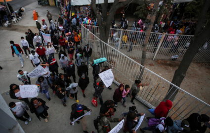 Migrants protest against COVID-19 restrictions known as Title 42, in Tijuana