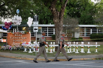 Frustrated onlookers urged police to charge into Texas school as massacre unfolded, witnesses say