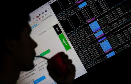 Sebastian Carsorio, 23, sips mate as he works with a home-made cryptocurrency mine with recycled computer parts from his work he uses for cryptomining, that allowed him to build his house with material he bought through the earnings of mining, in Escobar, in the outskirts of Buenos Aires, Argentina May 24, 2022. Picture taken May 24, 2022. Photo by Agustin Marcarian/REUTERS