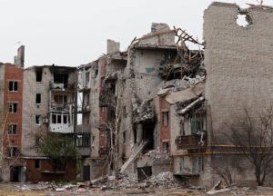 A view shows a heavily damaged apartment building in Popasna