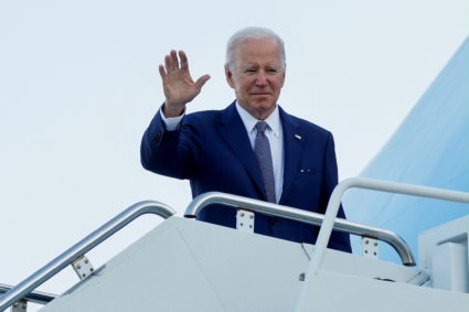 U.S. President Joe Biden boards Air Force One to depart from Yokota Air Base in Fussa