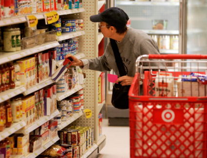 FILE PHOTO: A shopper looks at grocery items at a Target store in Los Angeles