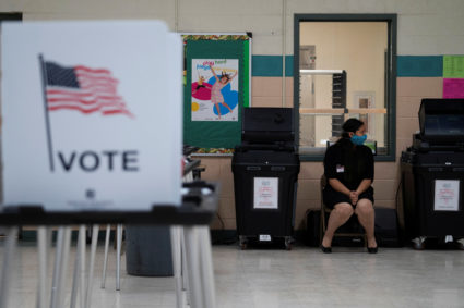 Machine judge Valerie Del Plain waits by the ballot box at Mesilla Elementary School during the New Mexico primary in Mesilla, New Mexico, U.S., June 2, 2020. Photo by Paul Ratje/REUTERS