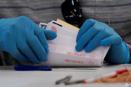 Control of U.S. Senate hangs in the balance as Georgia begins counting ballots