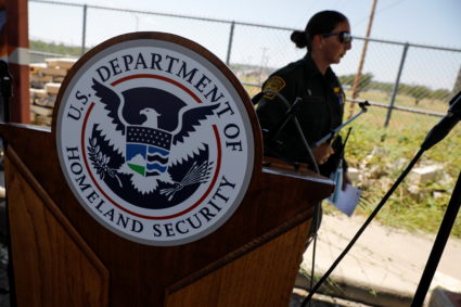The seal of the U.S. Department of Homeland Security is seen after a news conference near the International Bridge between...