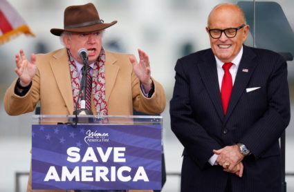 Attorney John Eastman gestures as he speaks next to U.S. President Donald Trump's personal attorney Rudy Giuliani, as Trump supporters gather ahead of the president’s speech to contest the certification by the U.S. Congress of the results of the 2020 U.S. presidential election on the Ellipse in Washington, U.S, January 6, 2021. Photo by Jim Bourg/REUTERS