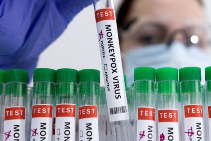 FILE PHOTO: Illustration shows test tubes labelled "Monkeypox virus positive