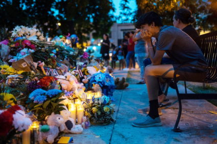 Mourners pay their respects at a memorial for the 21 killed in the mass shooting at Robb Elementary School, in the Uvalde Town Square in Uvalde, Texas on June 1, 2022. Picture taken June 1, 2022. Photo by Lucas Boland/USA TODAY NETWORK via REUTERS