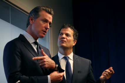 California Gov. Gavin Newsom (L) talks with California environmental agency secretary Jared Blumenfeld (R) during a news conference at the California justice department on September 18, 2019 in Sacramento, California. Photo by Justin Sullivan/Getty Images