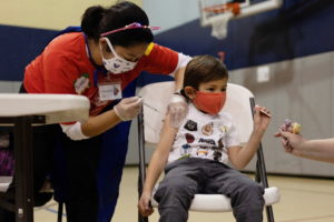 FILE PHOTO: Children age 5-11 receive vaccination against the coronavirus disease (COVID-19)