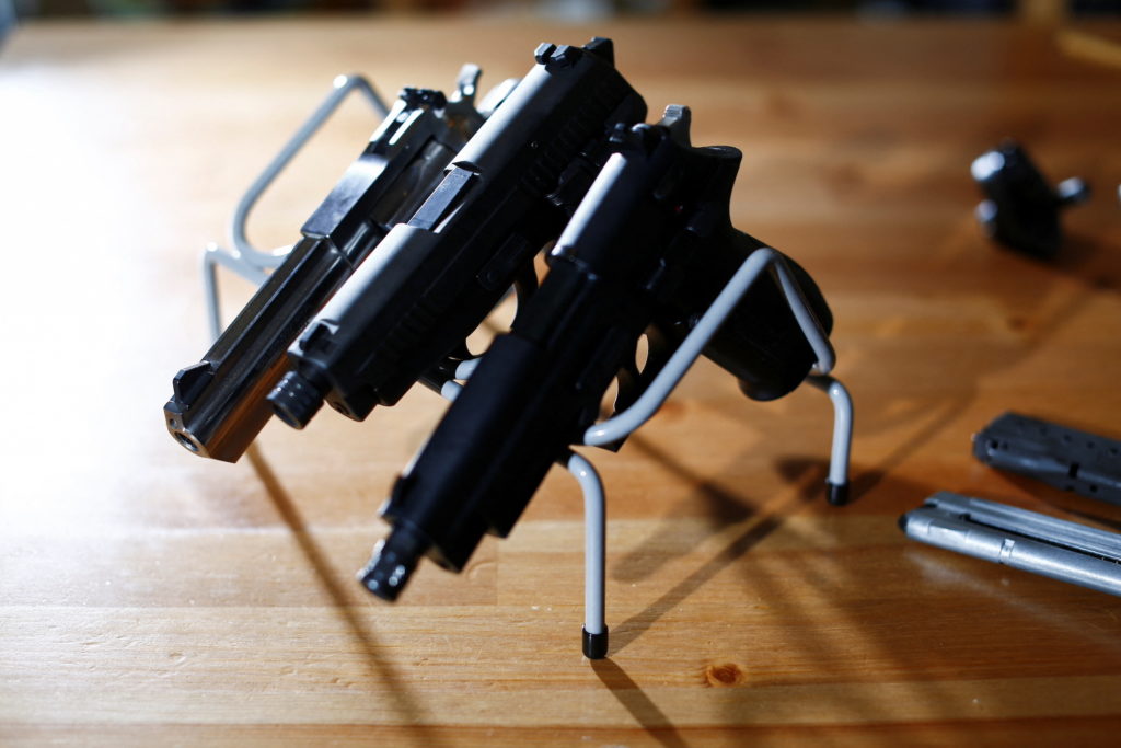 Canada's government introduces legislation to implement a "national freeze" on the sale and purchase of handguns