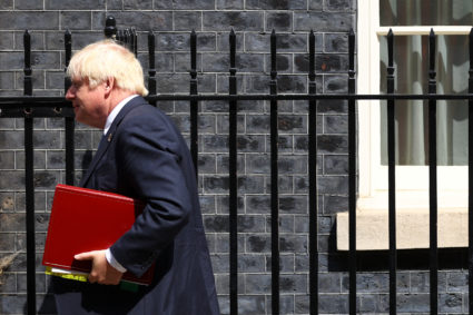 British Prime Minister Boris Johnson walks outside Downing Street in London, Britain, July 20, 2022. Photo by Hannah McKay/REUTERS