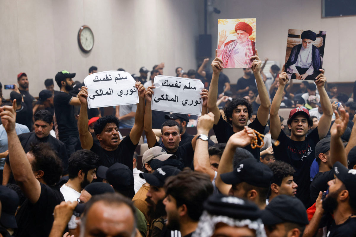 Hundreds of followers of Shiite cleric camp out in Iraqi parliament ...