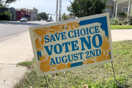 A sign urging voters to reject a state constitutional amendment declaring there is no right to abortion is seen during the primary election and abortion referendum at a Wyandotte County polling station in Kansas City, Kansas, U.S. August 2, 2022. Photo by Eric Cox/REUTERS