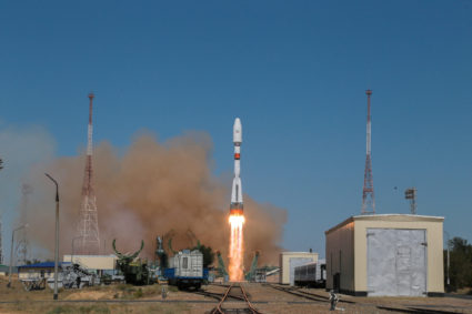 A Soyuz-2.1b rocket booster with the Iranian satellite "Khayyam" blasts off from the launchpad at the Baikonur Cosmodrome