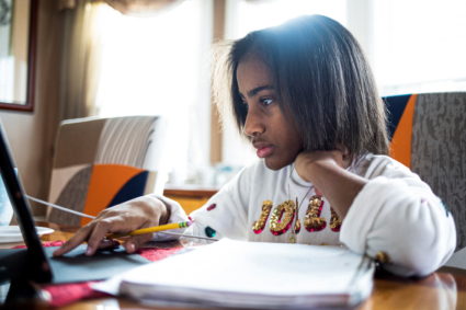 Children in Michigan attend school ahead of remote days on Friday