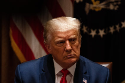 U.S. President Donald Trump listens during a meeting with members of the National Association of Police Organizations Leadership in the Cabinet Room of the White House July 31, 2020 in Washington, DC. Photo by Anna Moneymaker-Pool/Getty Images