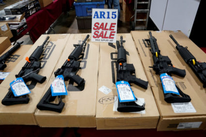 FILE PHOTO: AR-15 rifles are displayed for sale at the Guntoberfest gun show in Oaks, Pennsylvania