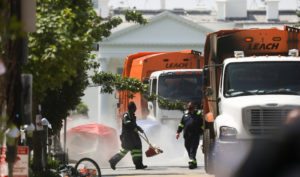 Police and city workers clear Black Lives Matter plaza area of protestors in Washington