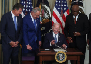 U.S. President Joe Biden signs "The Inflation Reduction Act of 2022" into law at the White House in Washington