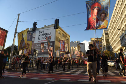 People march during a protest against the international LGBT event Euro Pride in Belgrade