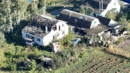 Drone footage shows a destroyed farm house in Balakliia
