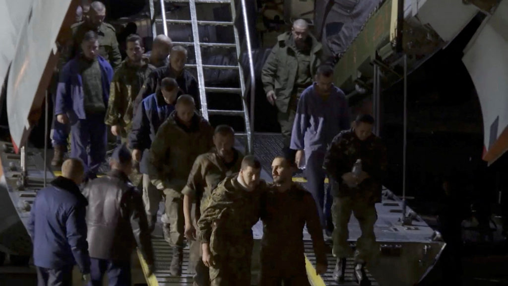 Prisoners of war from Russia, self-proclaimed Donetsk and Luhansk People's Republics leave the military plane as they arri...