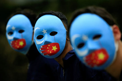 FILE PHOTO: Protest against the China's treatment towards the ethnic Uyghur people and calling for a boycott of the 2022 W...