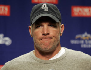 Minnesota Vikings quarterback Brett Favre talks to the media following their NFL football game against the Detroit Lions i...