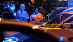 Memphis police officers work at one of multiple crime scenes