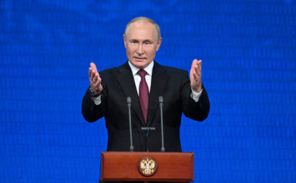 FILE PHOTO: Russian President Vladimir Putin delivers a speech during an event in Moscow