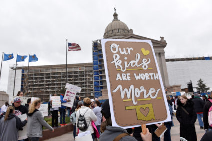 At a 2018 rally, teachers gathered outside the Oklahoma Capitol building during a walkout to demand higher pay and more funding for education. More than four years later, teachers say the future of education is on the ballot for the 2022 midterms. Photo by Nick Oxford/Reuters