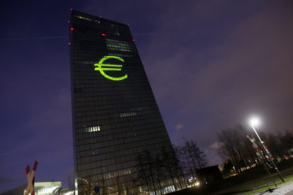 A Euro sign is seen moments before a symphony of light consisting of bars, lines and circles in blue and yellow, the colours of the European Union, illuminates the south facade of the European Central Bank (ECB) headquarters in Frankfurt, Germany, December 30, 2021. Photo by Wolfgang Rattay/REUTERS